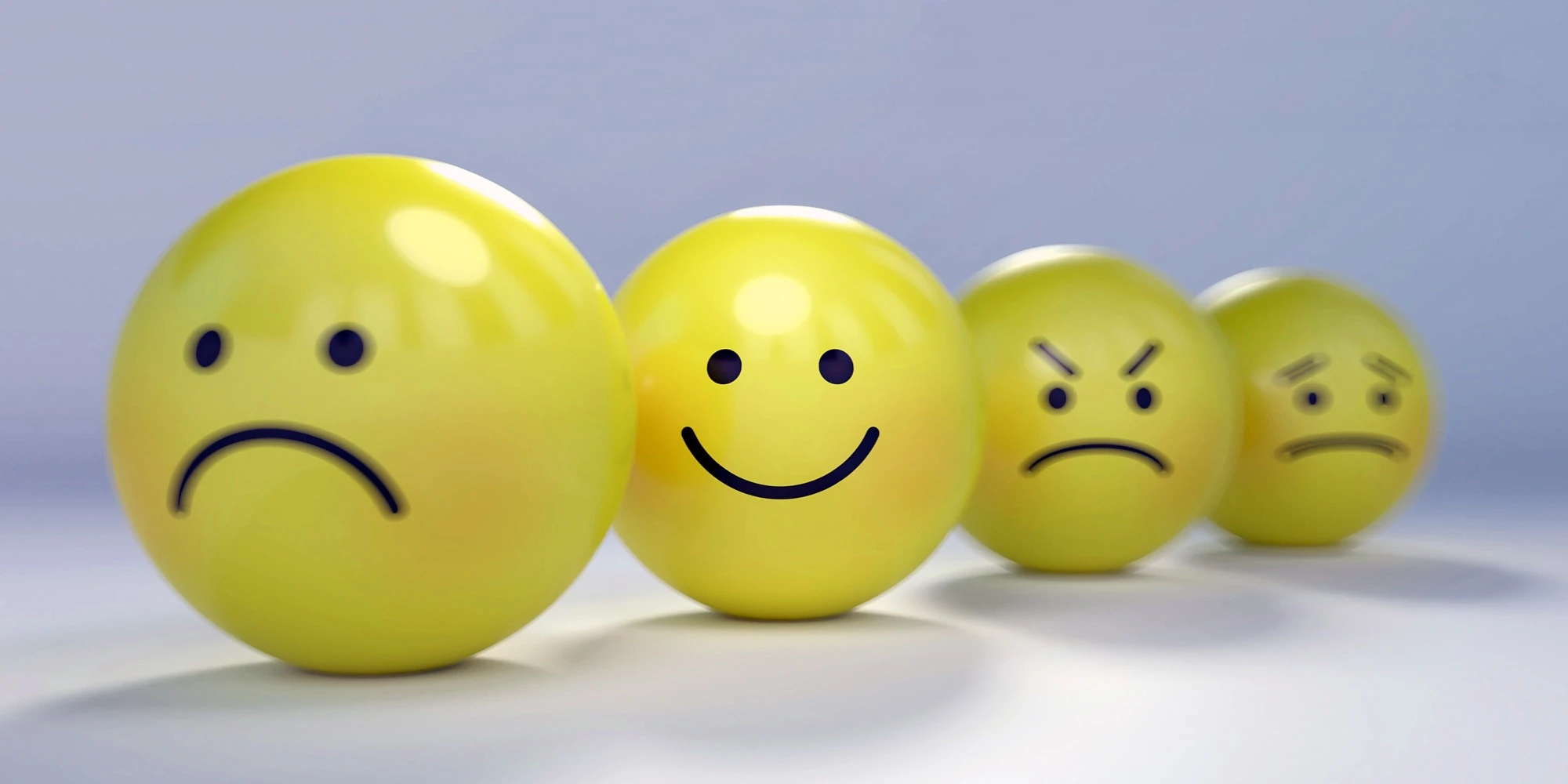 Fyra smileys som symboliserar organisatorisk och social arbetsmilj&ouml;, OSA.